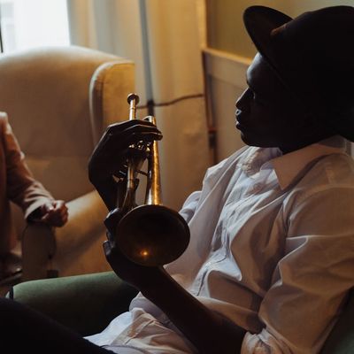 Portrait of Olga Zarična, the practice guide, smiling warmly.